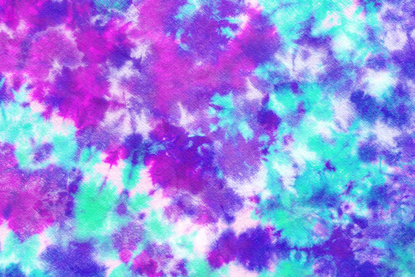 a close up of a purple and blue tie dye pattern