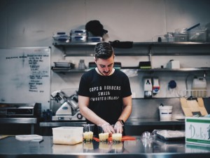 Man working in kitchen uniform t shirt