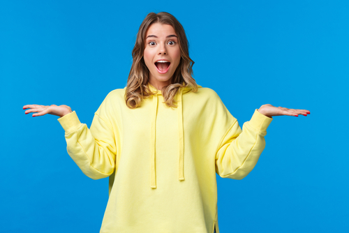 portrait of woman in bright yellow hoodie