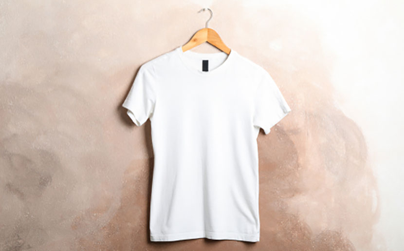 white shirt hanging on wall